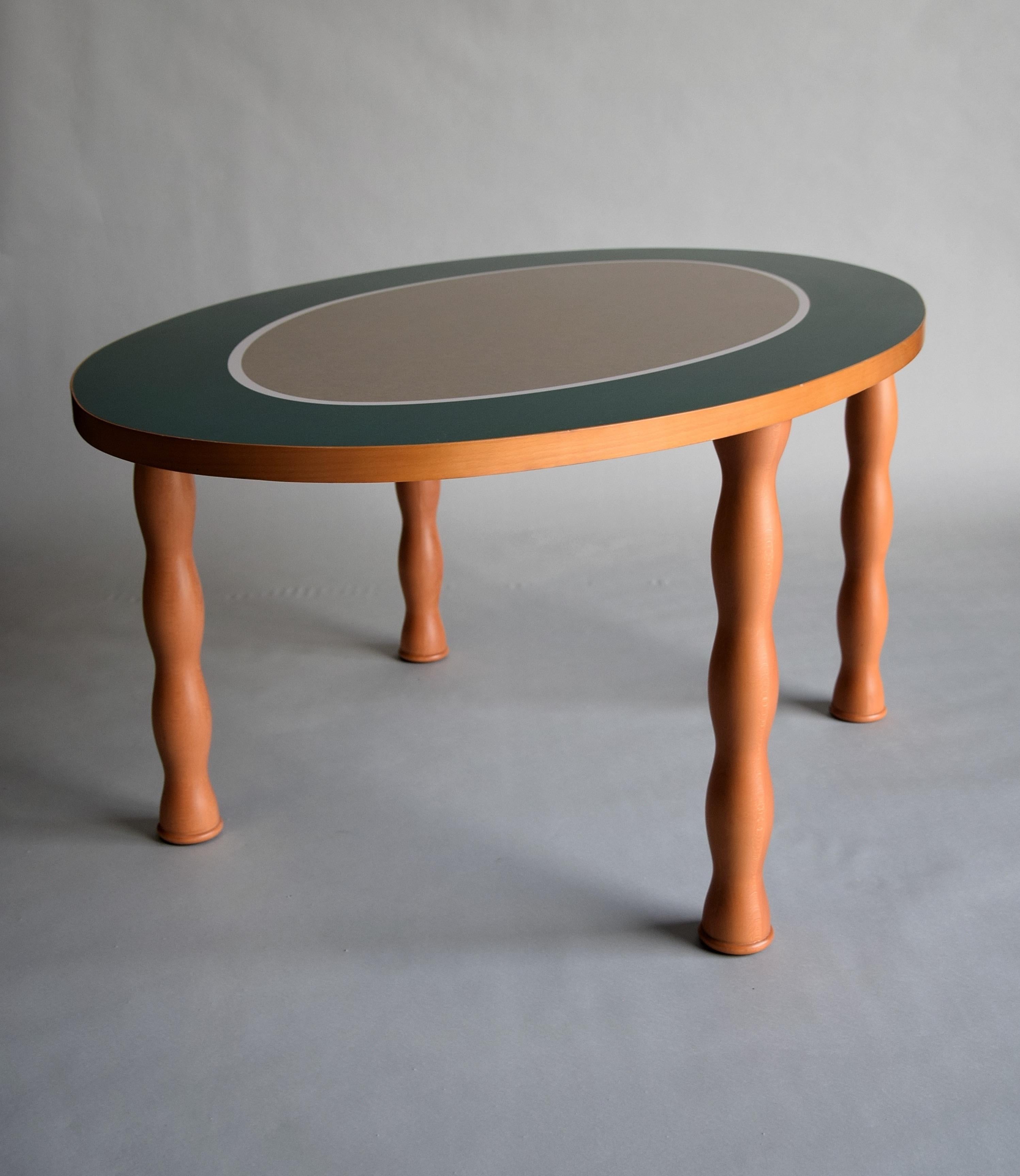 Presenting an extraordinary piece of design history: the Filicudi dining table, designed by Ettore Sottsass in 1992 and produced by Zanotta in Italy. Measuring 74 cm in height, 178 cm in length, and 108 cm in width, this table embodies timeless