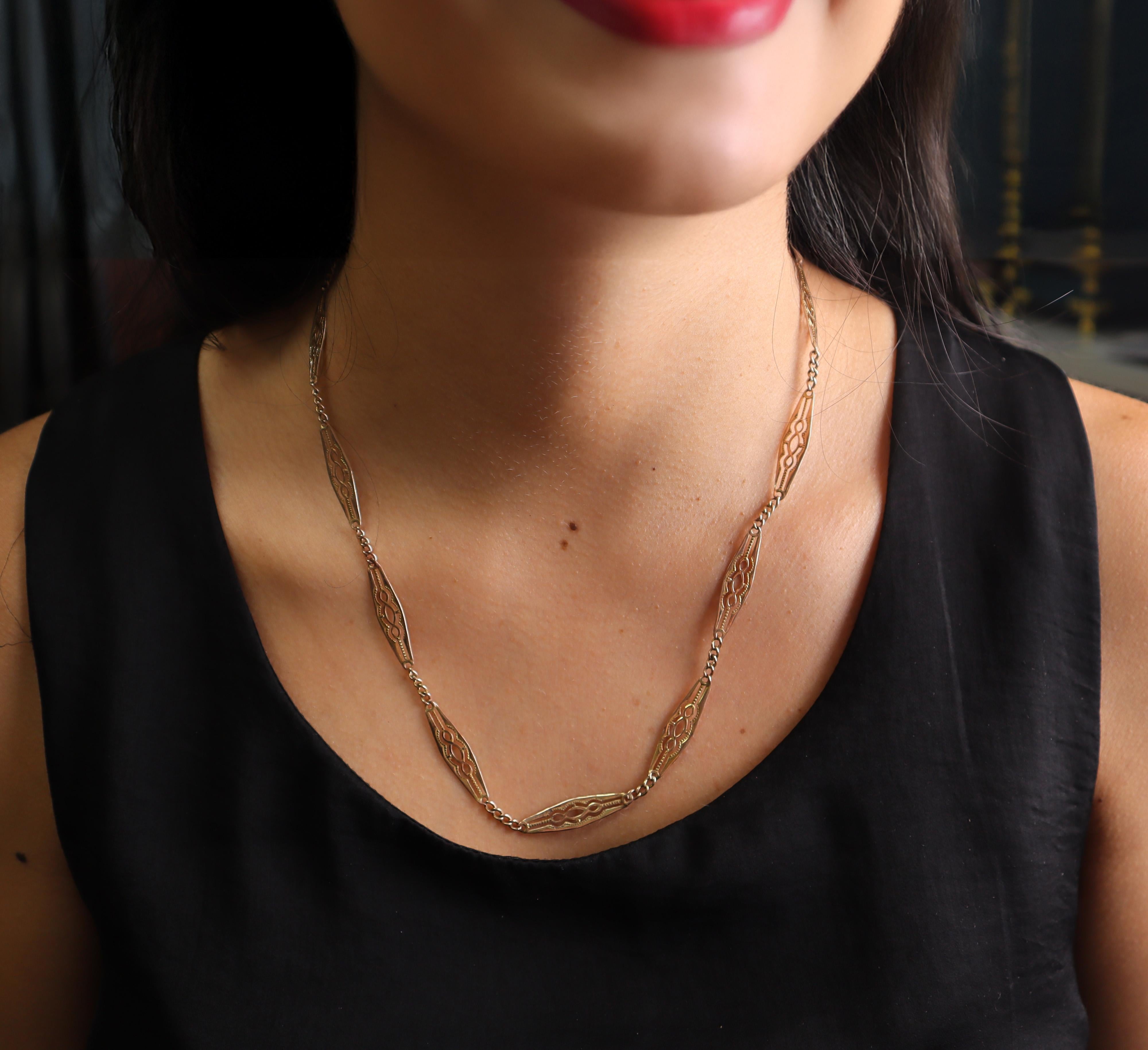 So light and pretty, this fetching filigree necklace is a beautiful example of turn-of-the-20th-century hand craftsmanship. Expertly fashioned in 18K rose gold, the necklace features delicate, airy filigree links that capture the romantic artistry