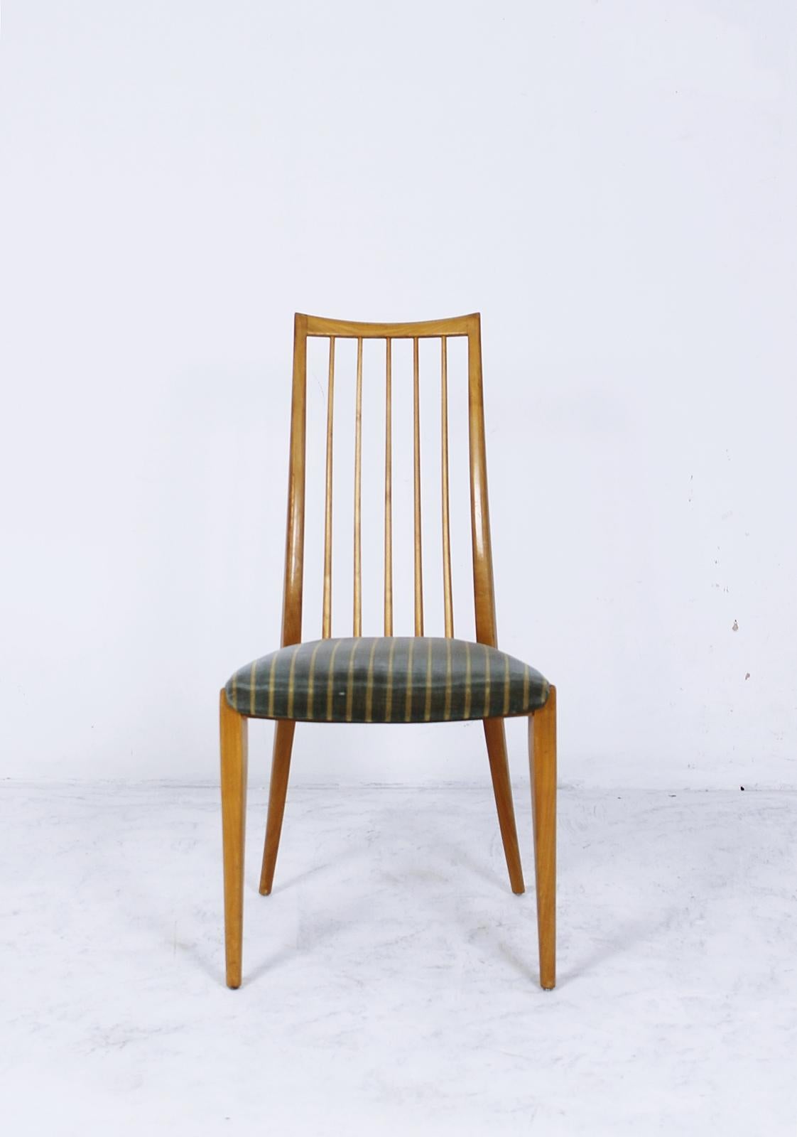This chair was designed by Ernst Martin Dettinger and produced in Germany in 1960 by Lübke. Made from solid cherry and upholstered in striped velvet.
.
The chairs are in good used condition. They have minor scratches on the legs. All chairs are
