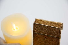 Filigree gilt silver cigarette box with spring-loaded hinged lid