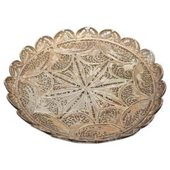 Filigree mesh silver bottle base