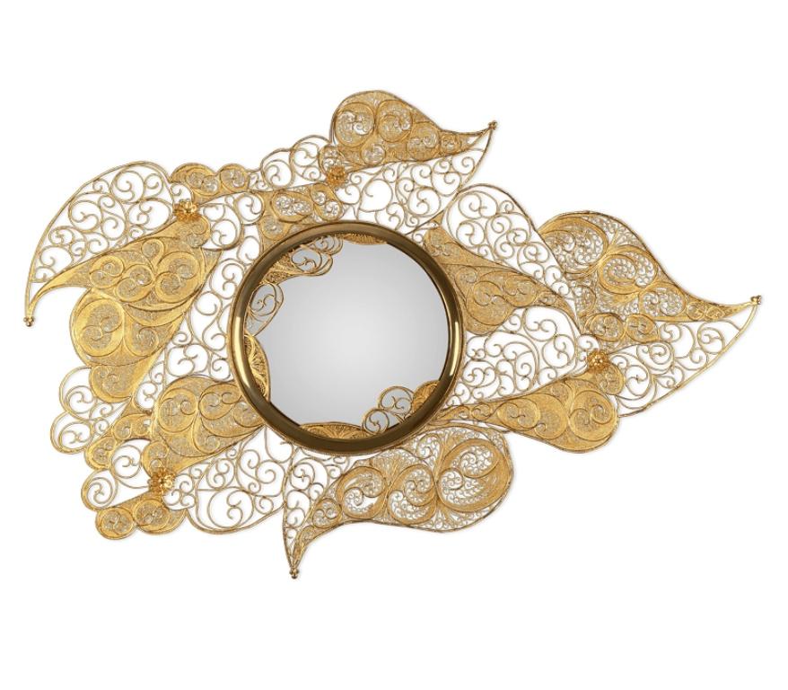 The Filigree Mirror resorts to one of the oldest jewellery making techniques known. Completely handcrafted, with each brass cord fitted with precision, the Filigree Mirror flourishes in a shape traditional to Portuguese culture and art. A true work