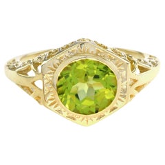 Anello solitario esagonale con peridoto in filigrana in oro giallo 14K
