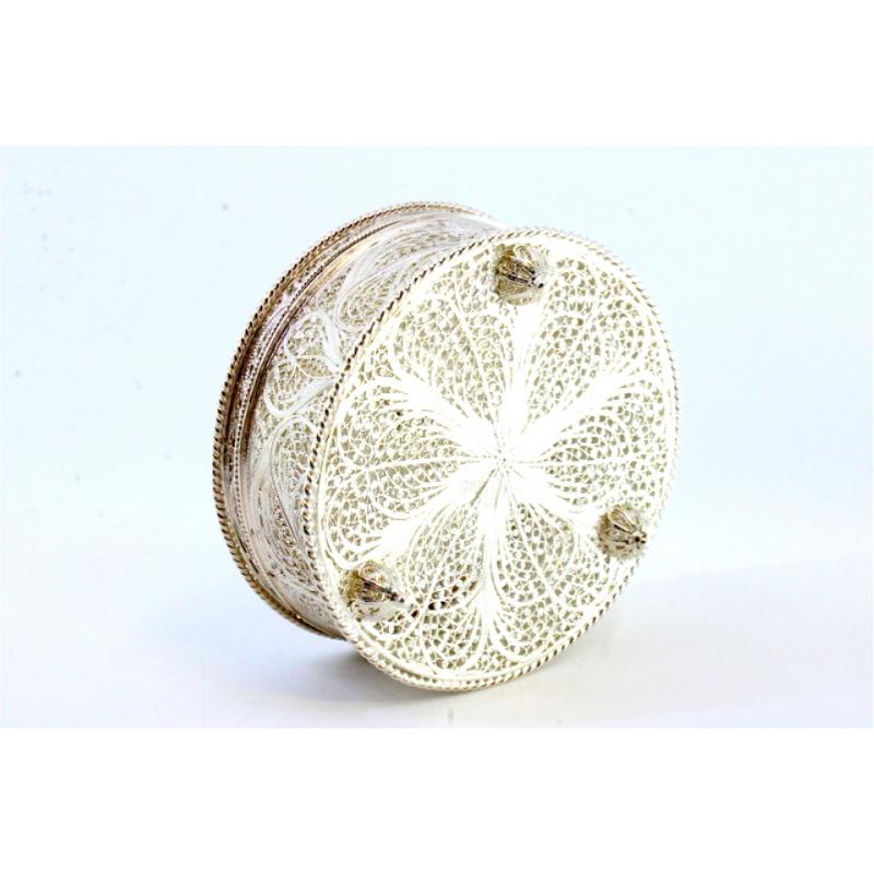Silver Filigree silver box with reliefs and cutouts, resting on three feet For Sale