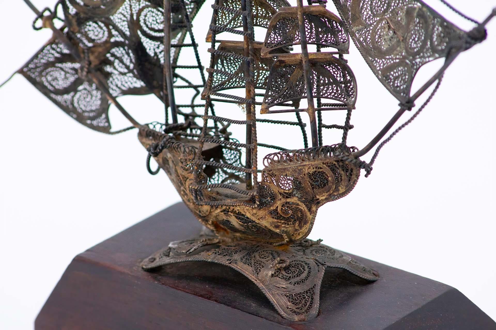 XX secolo Filigree silver caravel with wooden base in vendita
