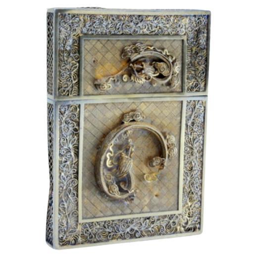 Filigree silver card case with Asian motifs and traces of gold