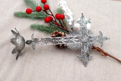 Filigree silver table cross with reliefs