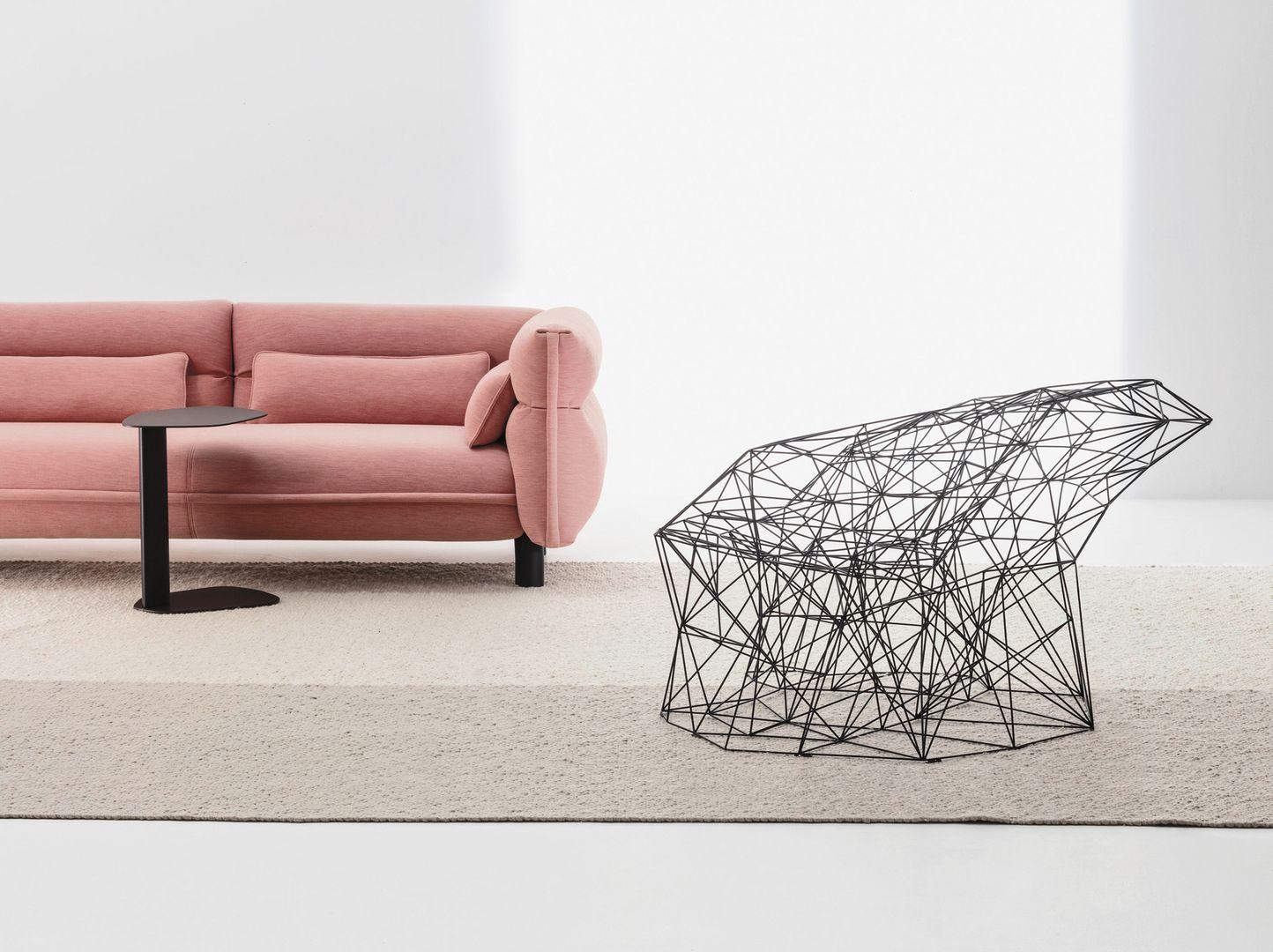 The futuristic Filinea armchair fuses natural and technological qualities. It takes its cue from euphorbia tirucalli trees and is made of round, extremely slender steel bars. The plants are very common in the South of Italy and their intricately