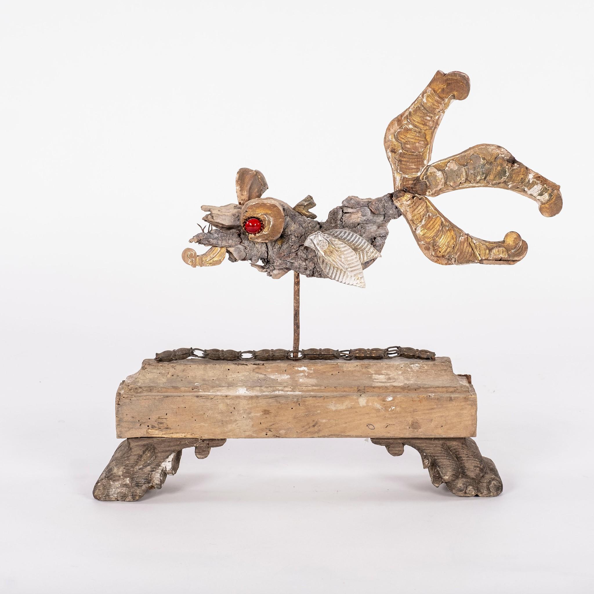 One-of-a-kind fish sculpture created from 18th-century gilt fragments. 

Filippo Gherardi was born in Livorno, Italy. Driven by his passion for antiques, he studied and practiced the art of restoration and gilding. The intriguing history and patina