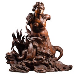 A late 17th Italian carved limewood figure of Mermaid, circle of Filippo Parodi