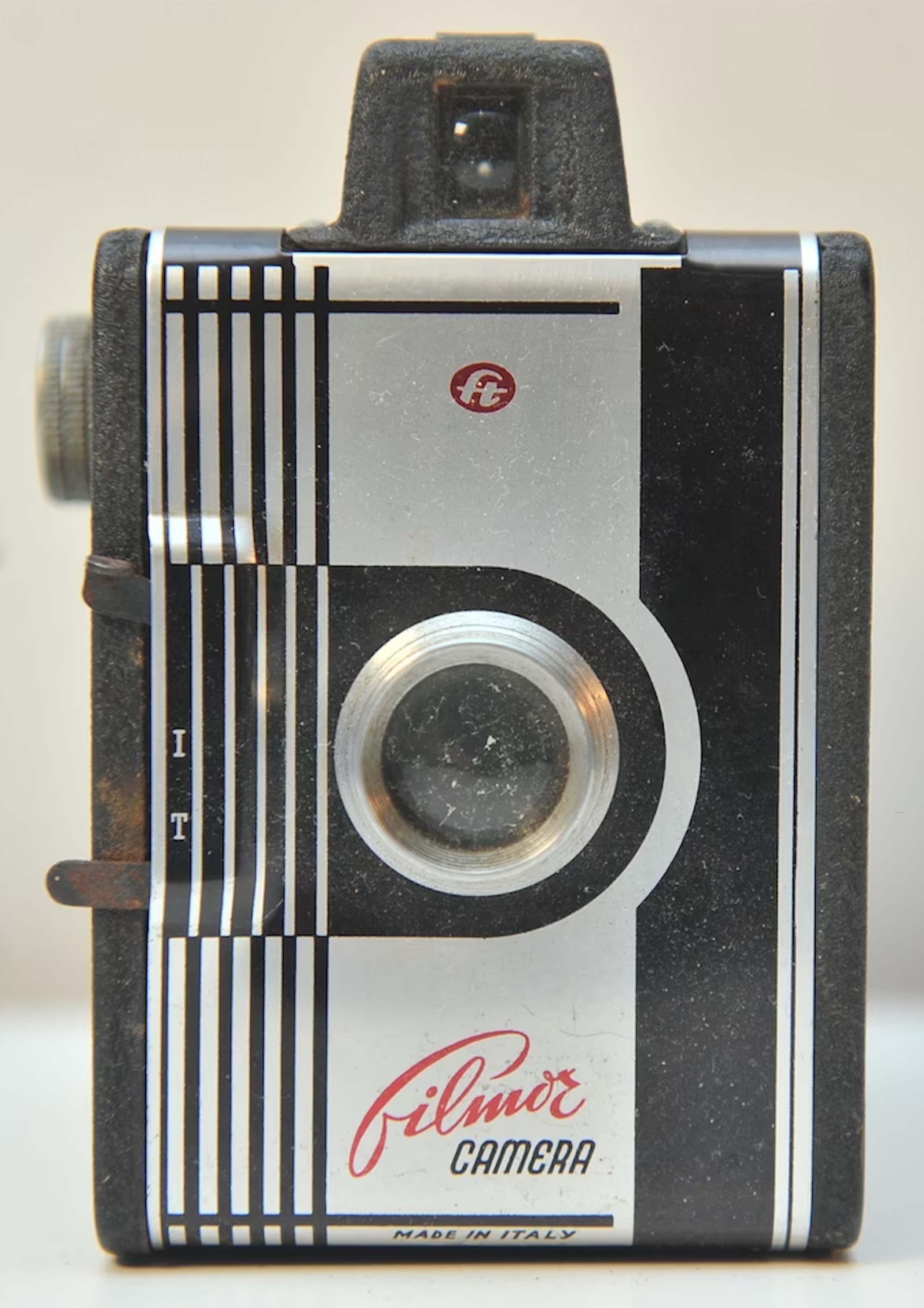 Filmor Camera 120 Film Box Eye-level Finder Camera With Achromatic F11 Lens Made by Fototecnica Torino of Italy 1950's


The Filmor Camera was a box camera, made by Fototecnica Torino. It made 6x9cm exposures on type No. 120 rollfilm. It had an