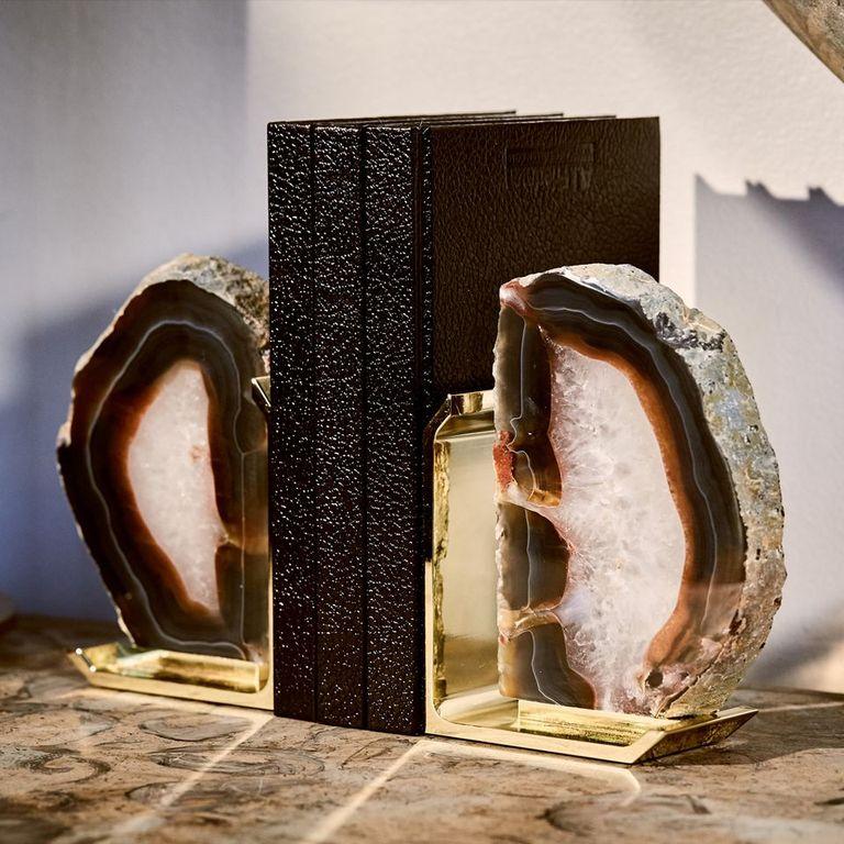 The Fim bookends are designed to frame your treasured books with style. Crafted from semi-precious gems formed inside ancient lava streams, and polished gold, these timeless classics are heirloom-quality pieces. Known for: promoting reading