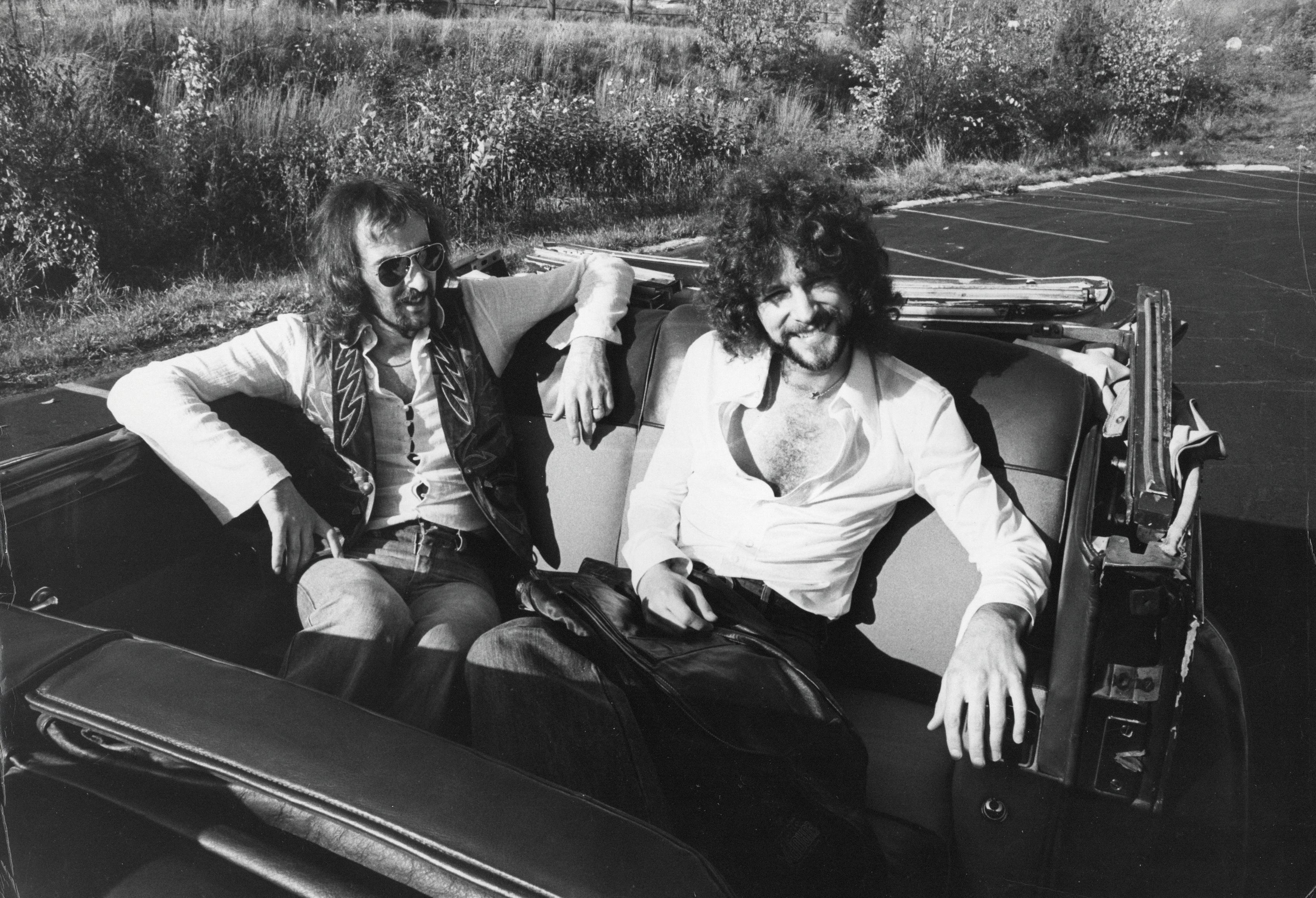Fin Costello Black and White Photograph - John McVie and Bob Welch of Feetwood Mac in Backseat Vintage Original Photograph