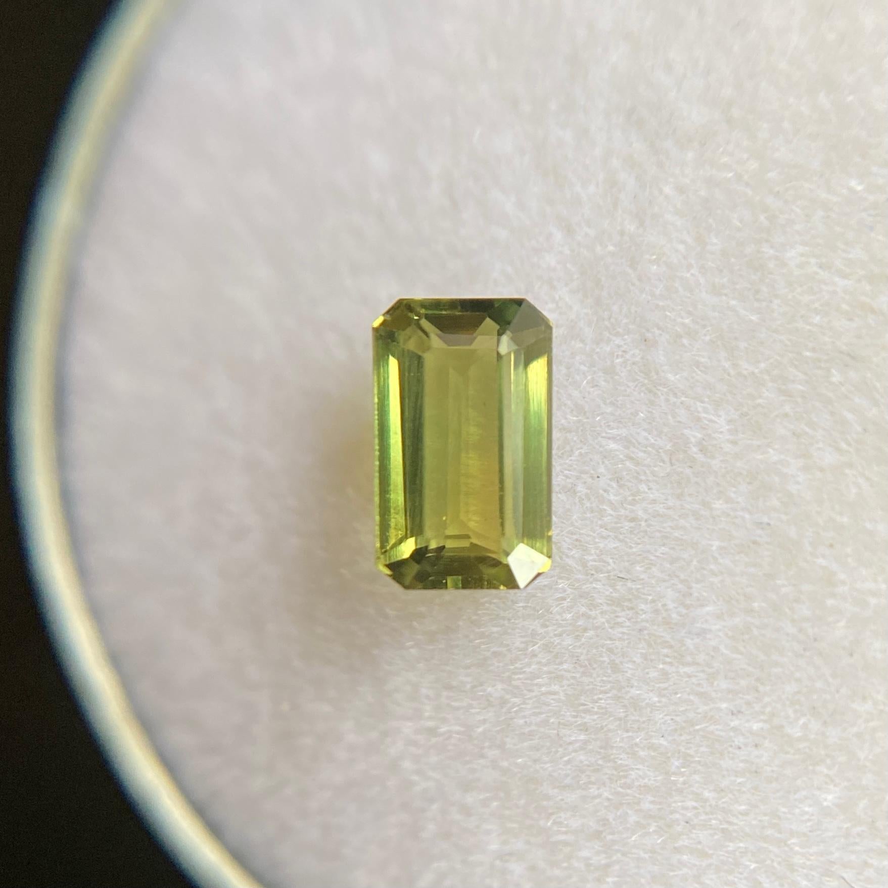 Fine Natural Untreated Australian Green Sapphire Gemstone.

0.84 Carat with a beautiful yellow green colour and an excellent emerald octagon cut. Also has excellent clarity, a very clean stone.

Totally untreated and unheated, very rare for natural