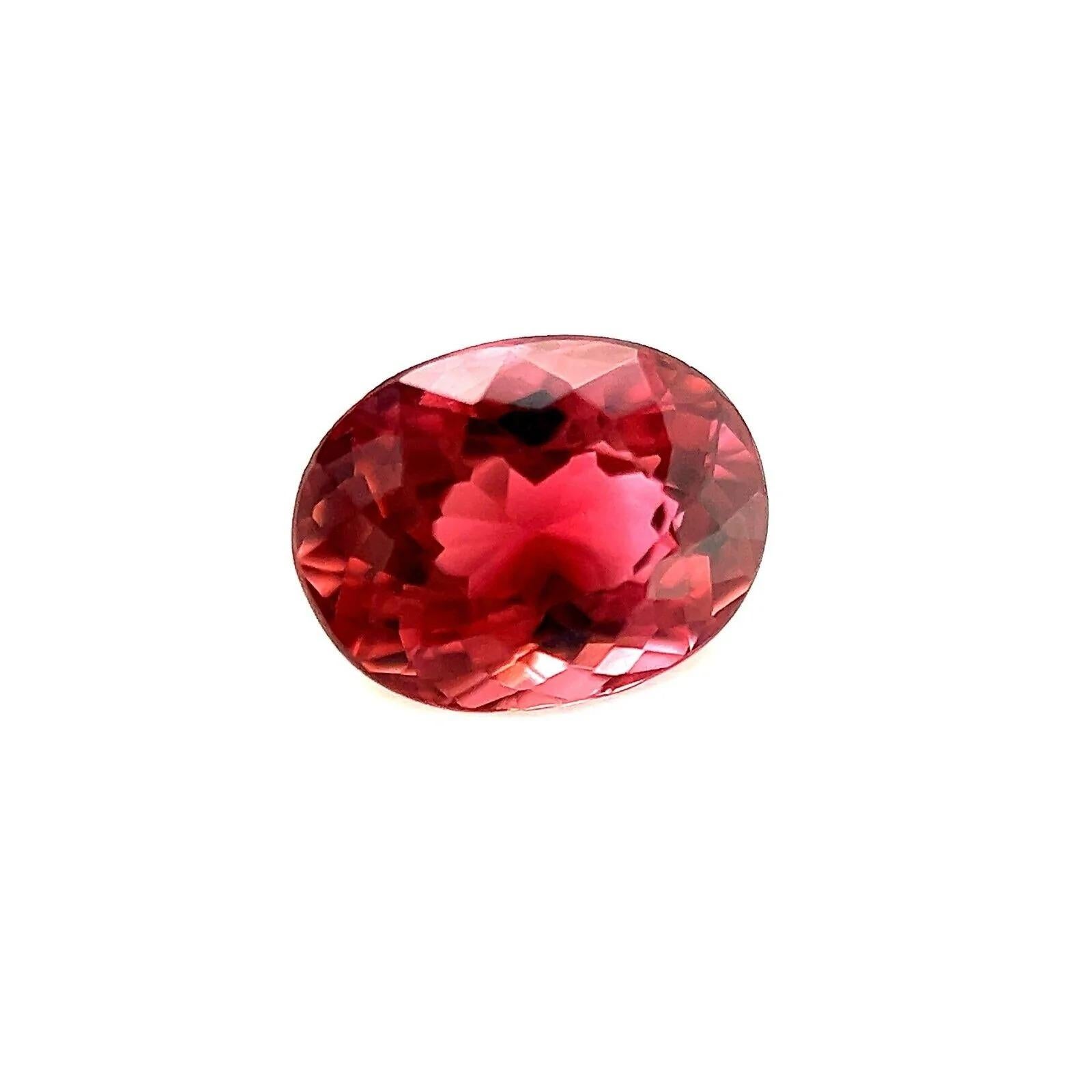 Fine 1.00ct Vivid Pink Orange Tourmaline Oval Cut Loose Gem 7x5.4mm

Fine Pink Purple Tourmaline Gemstone.
1.00 Carat with a beautiful vivid pink purple colour and good clarity. Also has a very good oval cut with good proportions and symmetry. Shows