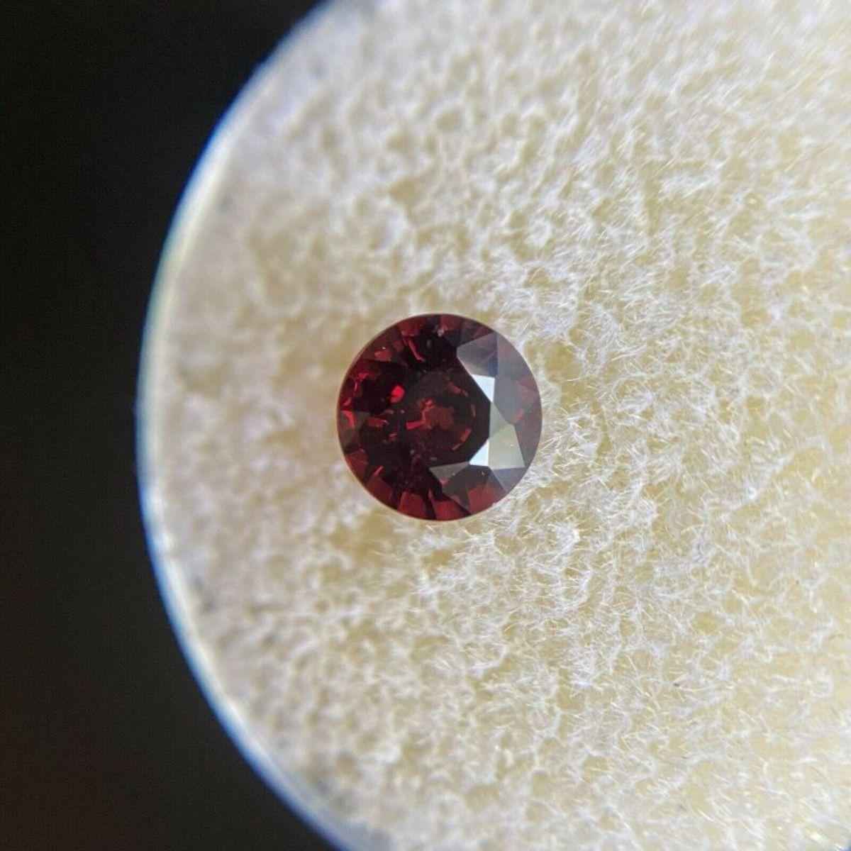 Fine 1.15ct Vivid Red Spessartine Garnet Round Diamond Cut Loose Gem 5.8mm

Fine Natural Spessartine Garnet Loose Gemstone. 
1.15 Carat with a beautiful vivid orange red colour and good clarity. Clean stone with only small natural inclusions visible