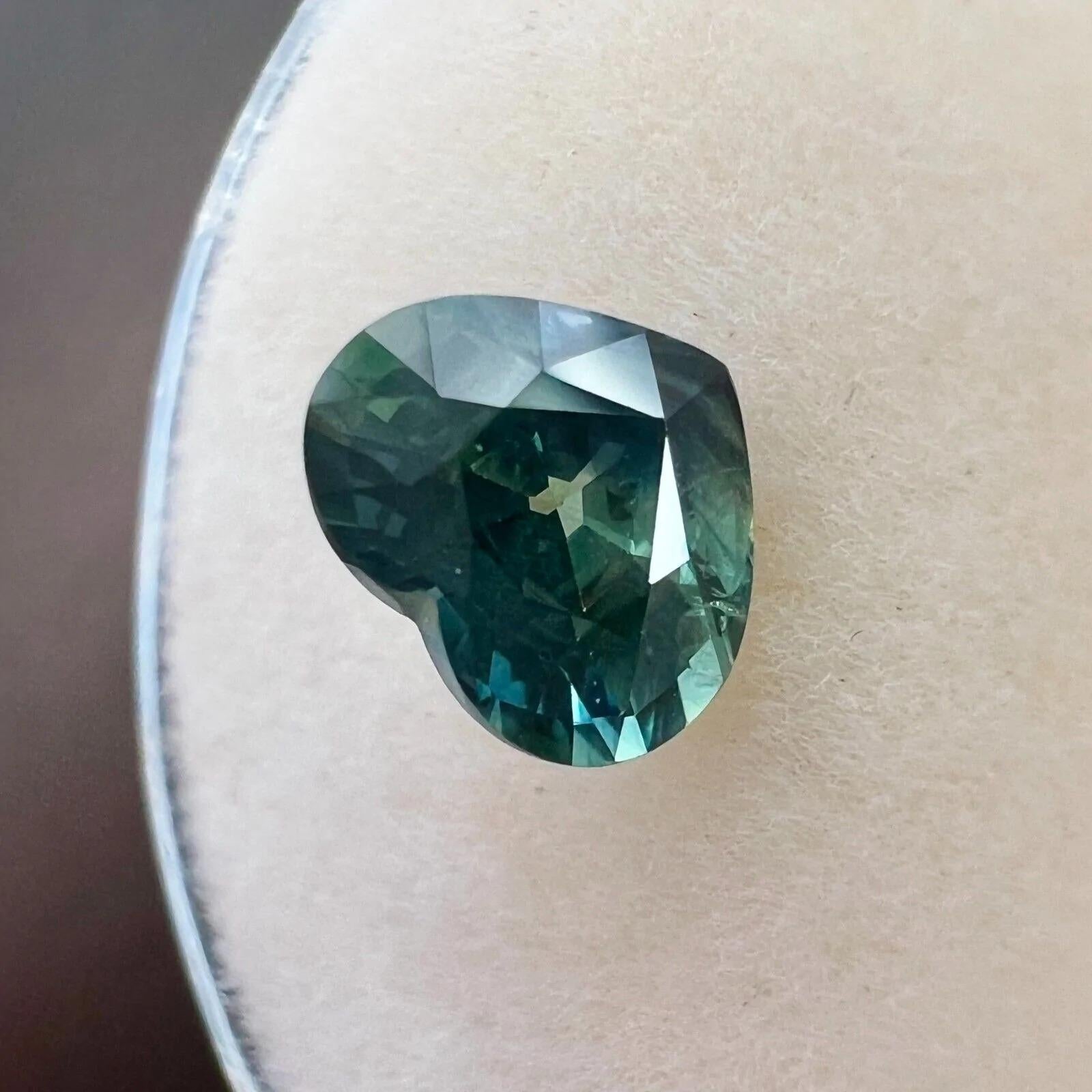 Fine 1.20ct Australian Vivid Green Blue Sapphire Heart Cut Rare Gem 6.7x5.5mm

Natural Green Blue Australian Sapphire Gem.
1.20 Carat with a beautiful vivid green blue colour. Has very good clarity, a very clean stone with only some small natural
