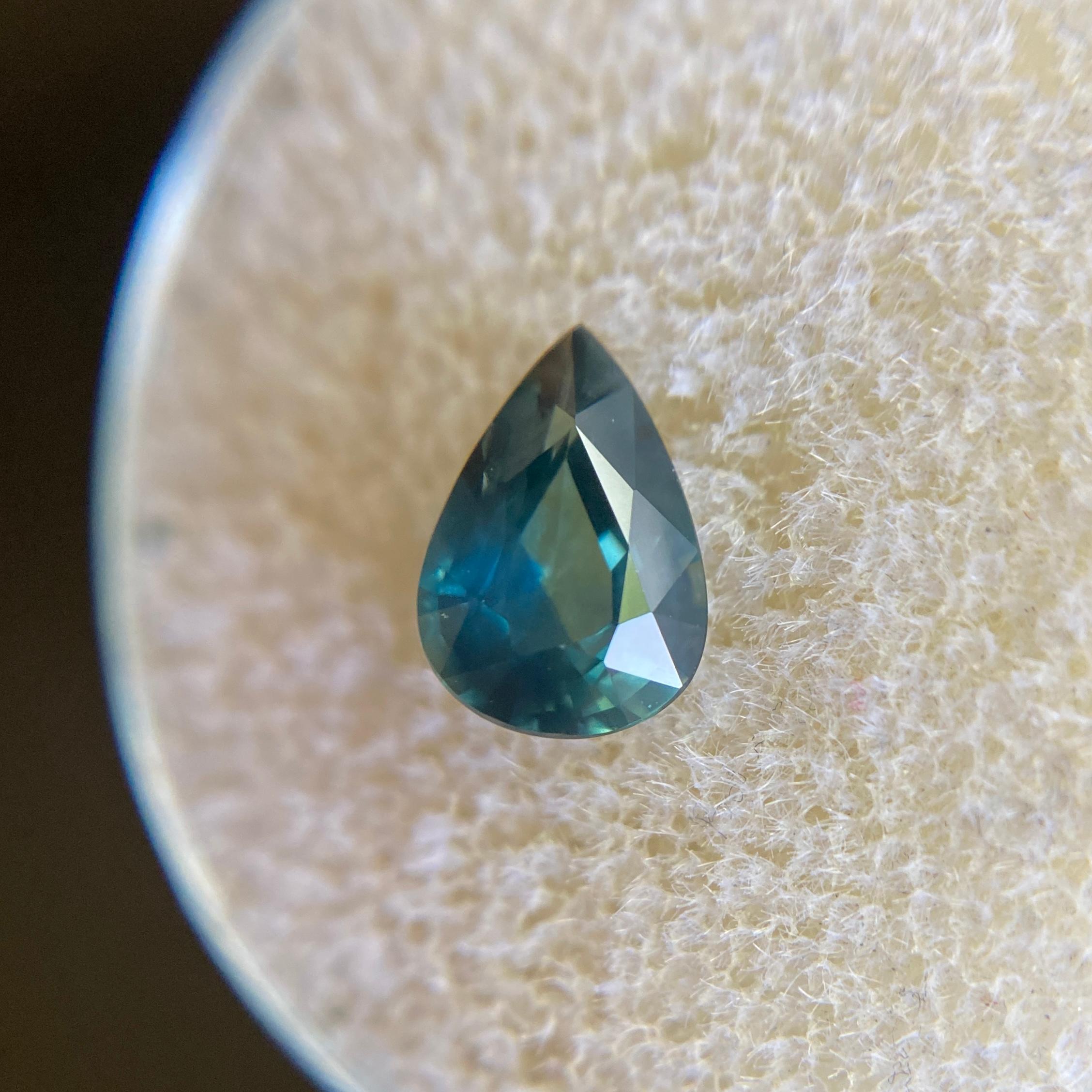 FINE Natural Greenish Blue Teal Australian Sapphire Gemstone.

1.26 Carat with a beautiful and unique greenish blue teal colour and excellent clarity, a very clean stone with only some small natural inclusions visible when looking closely.
Also has