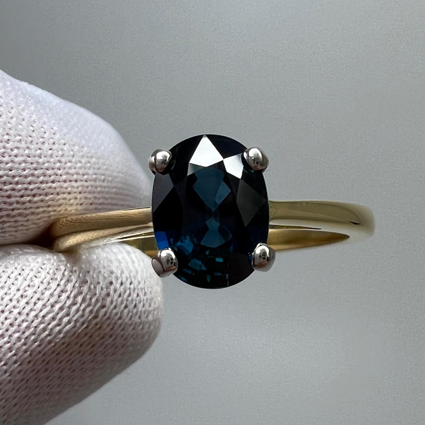 Natural Fine Teal Blue Sapphire 18k White & Yellow Gold Solitaire Ring.

1.47 Carat stone with a stunning deep teal blue colour, also has excellent clarity, a very clean stone. 

This sapphire also has an excellent oval cut which shows lots of