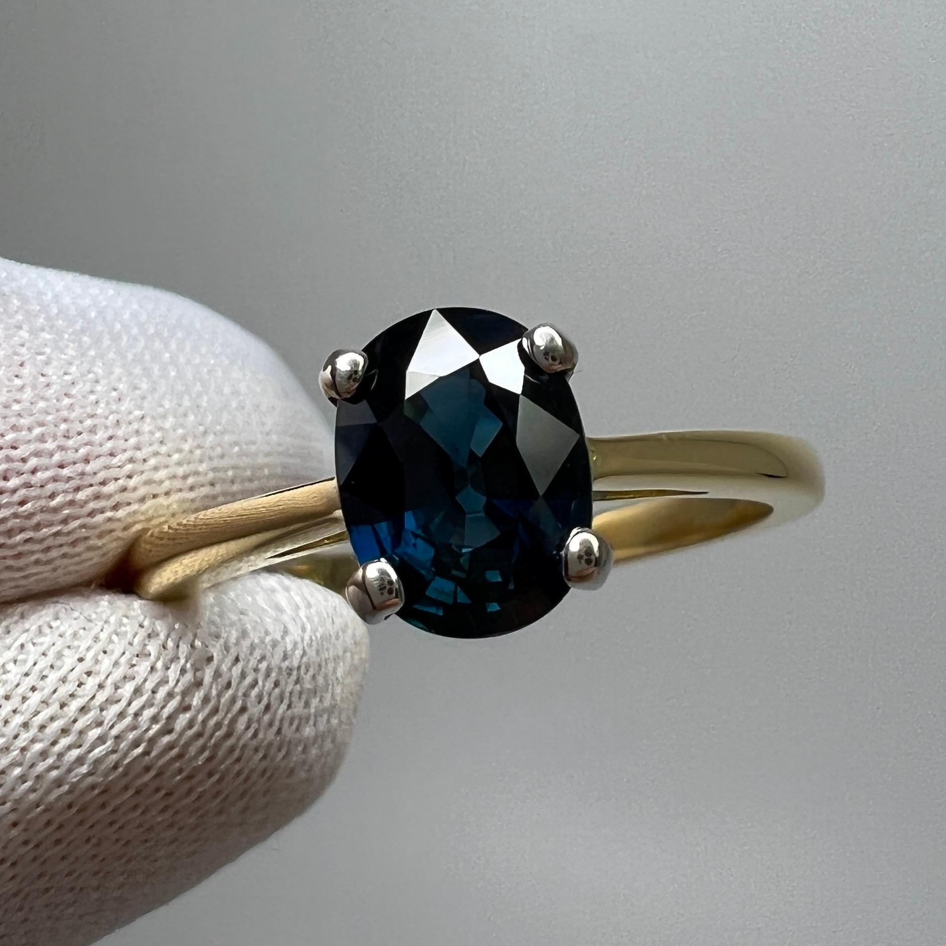 Fine 1.47ct Teal Blue Sapphire Oval Cut 18k White Yellow Gold Solitaire Ring In New Condition For Sale In Birmingham, GB