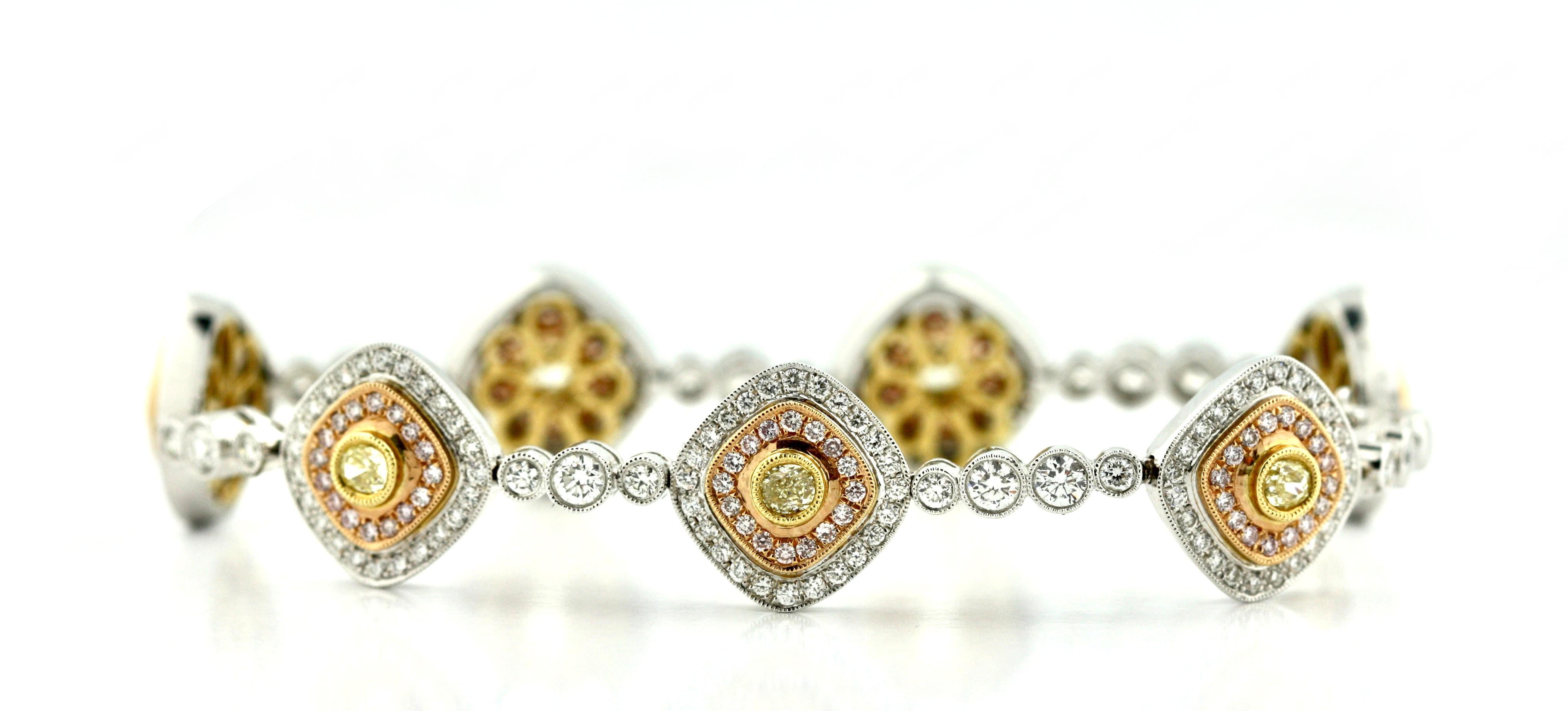 
Fine 18 Karat Gold, Diamond and Diamond Bracelet, 
composed of round, yellow and pink diamonds weighing a total of approximately 4.95 carats, gross weight approximately 18 dwts,
length 7 inches