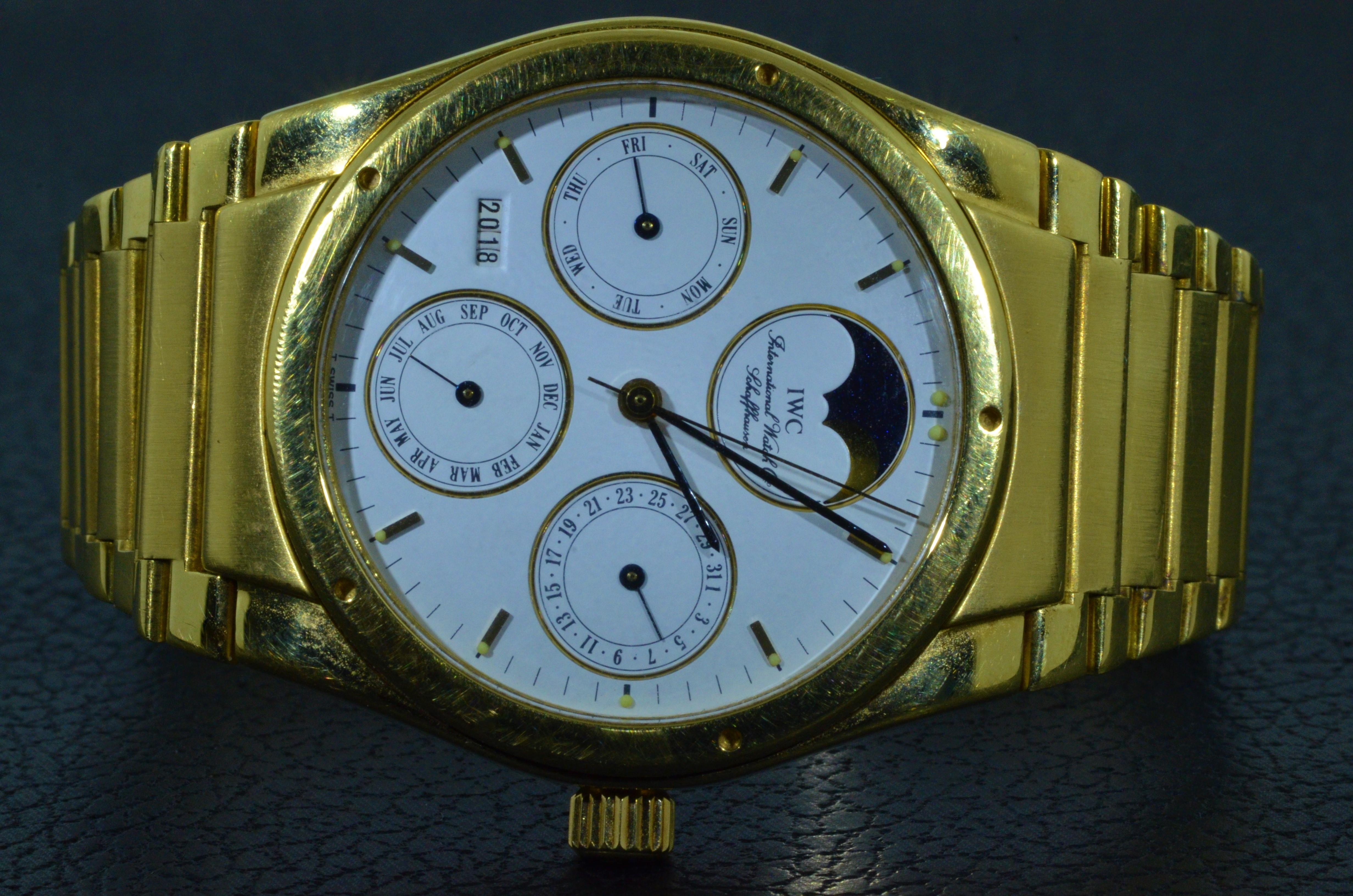 A Fine 18k Gold Automatic Perpetual Calendar Wristwatch with Moon Phases and Bracelet
Signed IWC, Schaffhausen, Ingenieur, Perpetual
Automatic jeweled movement, white dial, applied baton numerals with luminous tips, luminous hands, three subsidiary