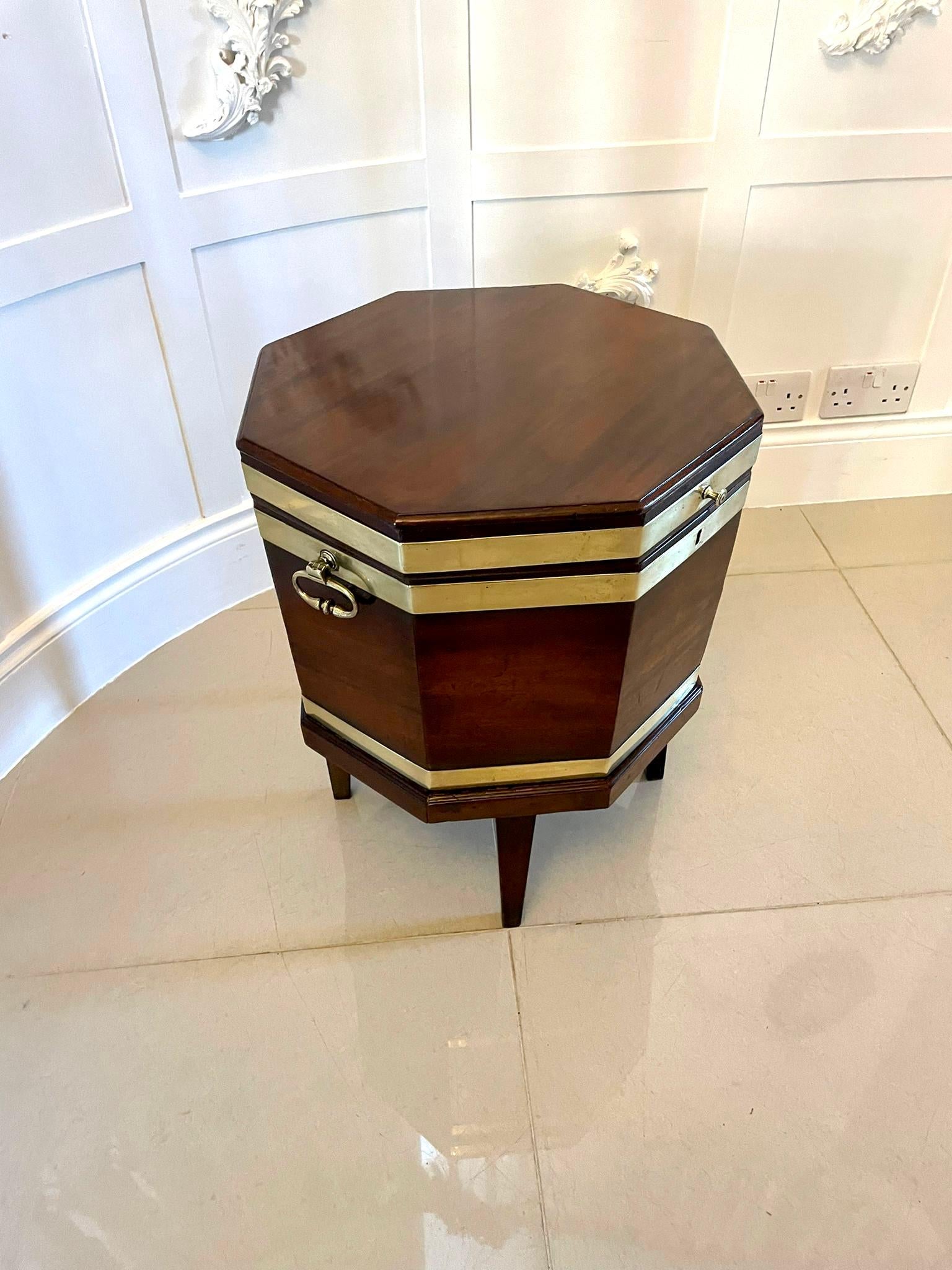 Fine 18th century antique George III quality mahogany brass bound wine cooler having a quality mahogany hexagonal shaped lift up top opening to reveal the original lead lined interior, 3 original brass bounds, 2 original carrying handles, original