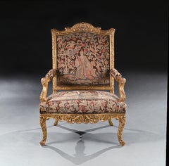 Fauteuil en bois doré d'époque Régence française du XVIIIe siècle