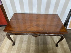 Fine 18th century Georgian walnut table with gilt shells and claw and ball feet