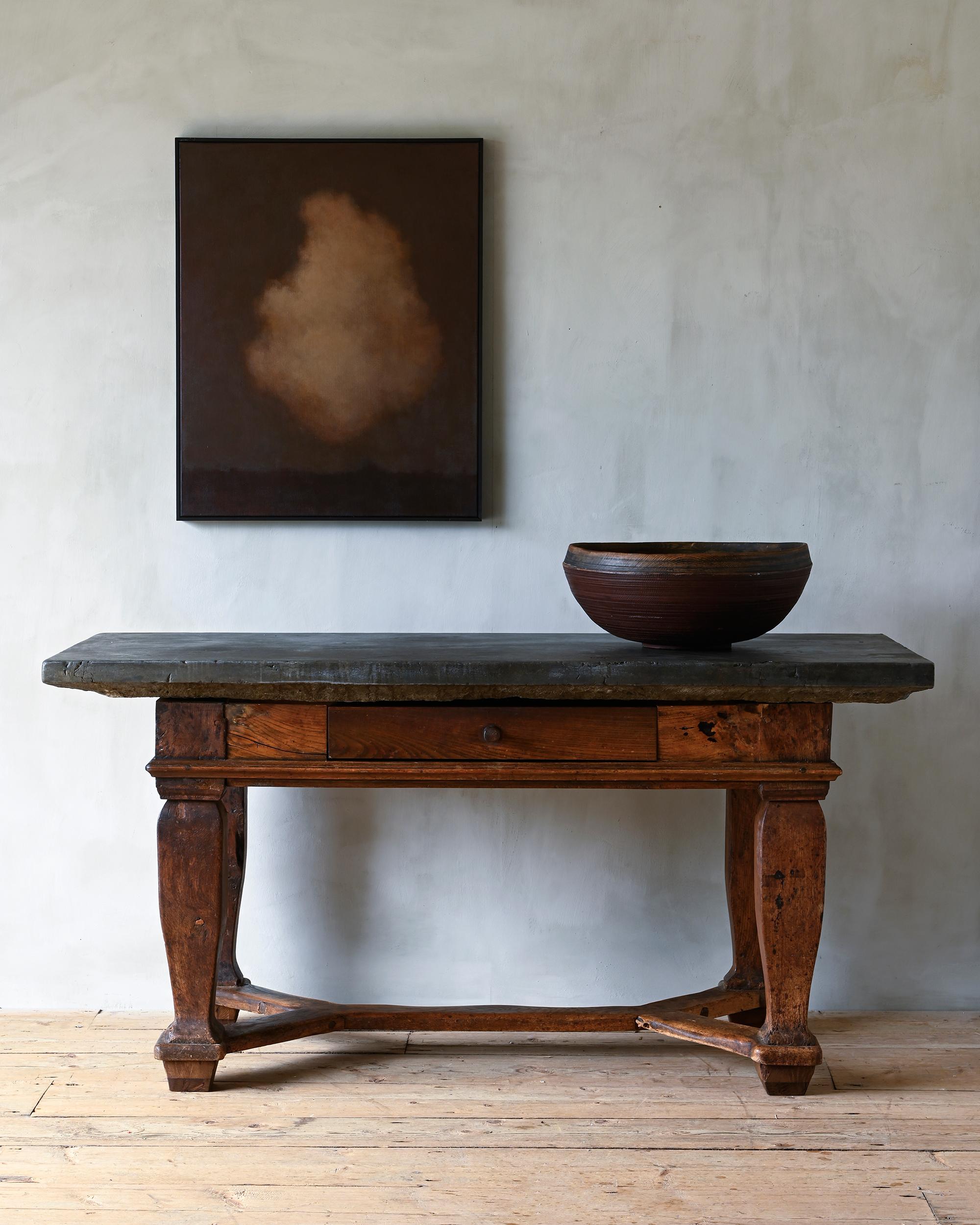 Fine 18th century Swedish Baroque (Komstad) limestone top table with one drawer to the front and baluster-shaped legs joined by y-stretcher. Works excellent as a centre table as well, Sweden, circa 1750.

The antique Komstad limestone top has