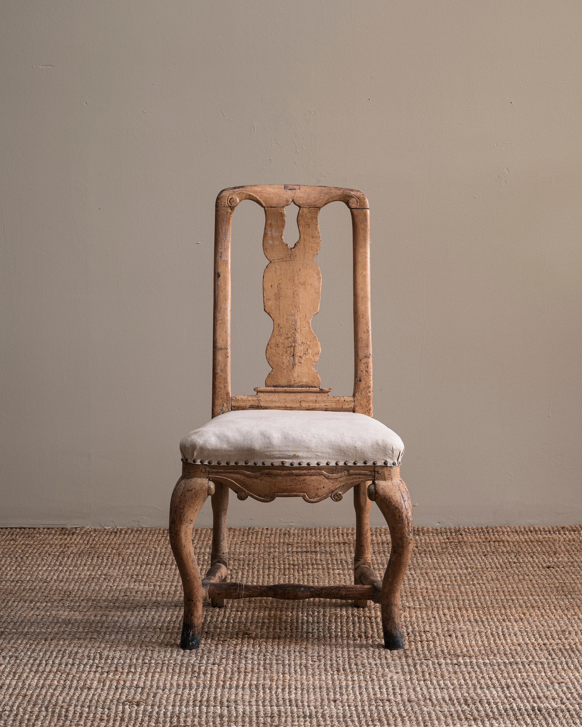 Fine 18th century Swedish late Baroque chair in Its original condition with great patination to the wooden surface. Ca 1850 Sweden.