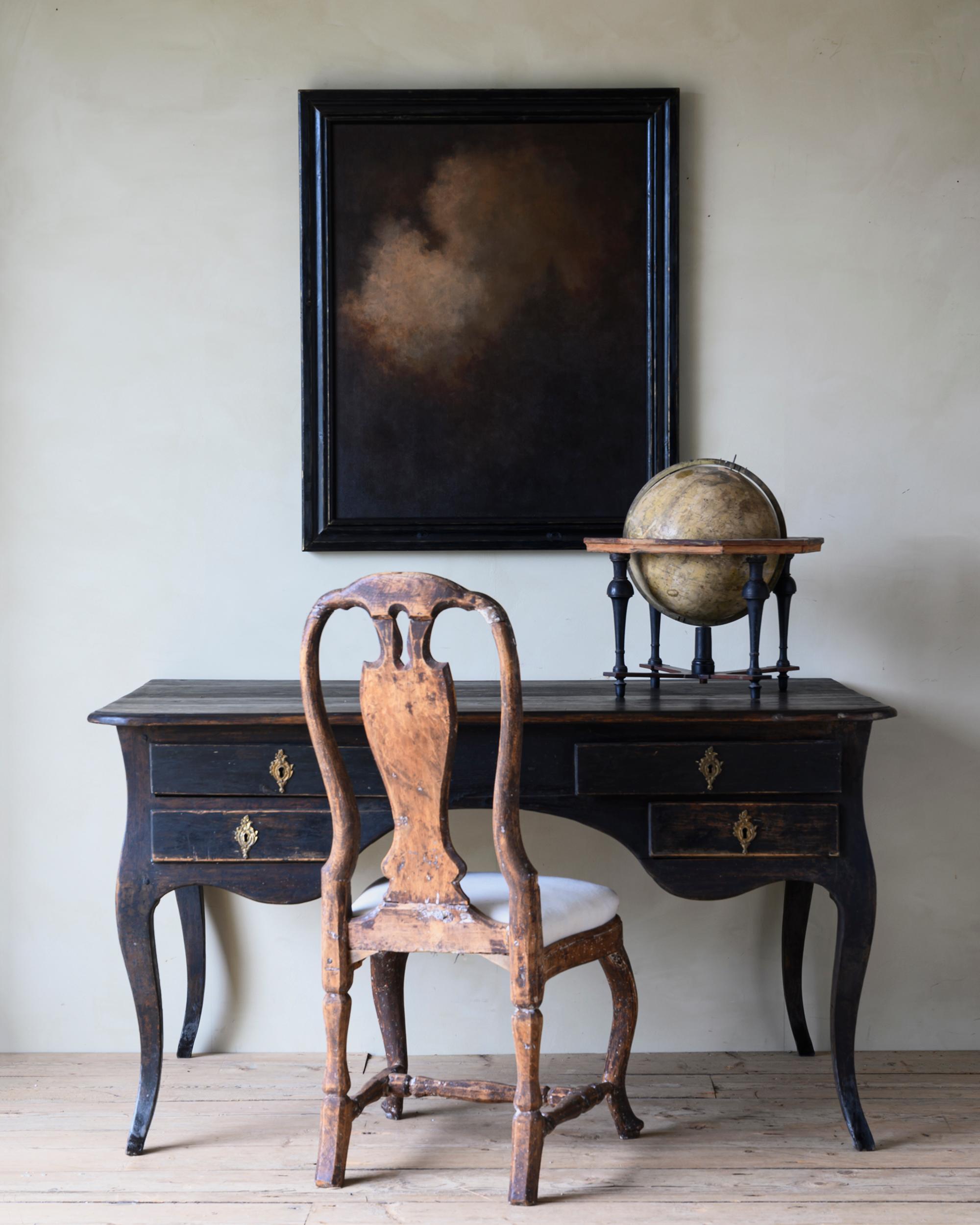 Fine 18th century Swedish black painted Rococo desk with four drawers and great proportions and shape. Ca 1760 Sweden.