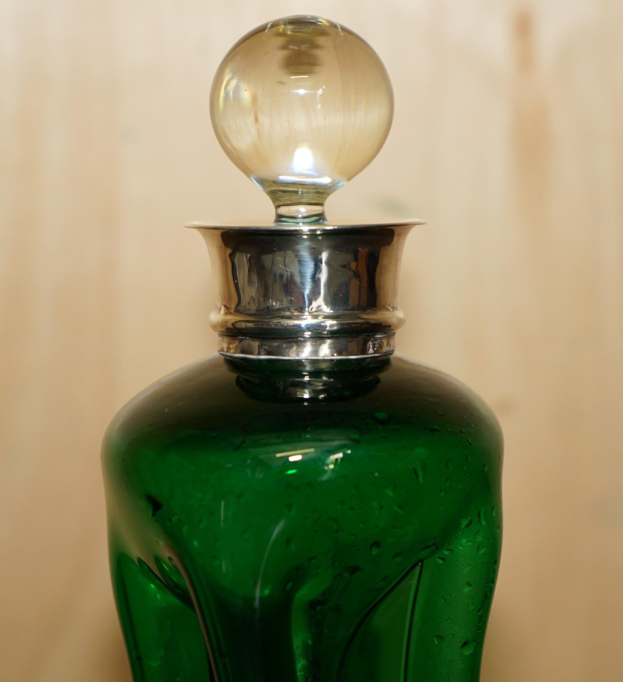 Royal House Antiques

Royal House Antiques is delighted to offer for sale this sublime antique 1904 Wine Port or Spirit decanter with Sterling silver collar and cut glass crystal stopper

A good looking and decorative piece, it has the following
