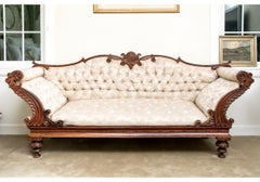 Canapé/lit de jour en bois de rose sculpté A.I.C.