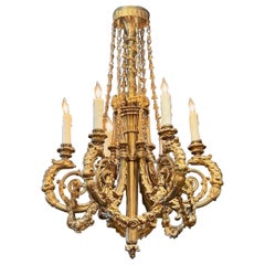 A.I.C.. Lustre français Louis XVI en bronze doré