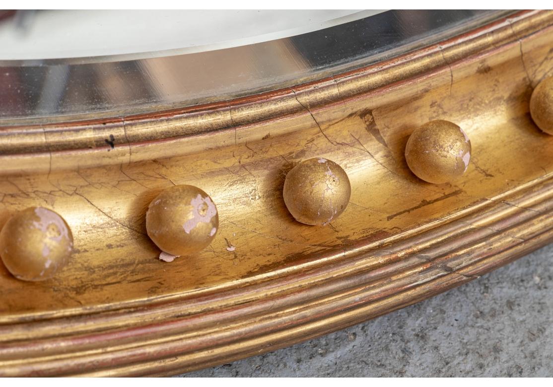 Georgien Miroir ovale biseauté et doré du XIXe siècle en vente
