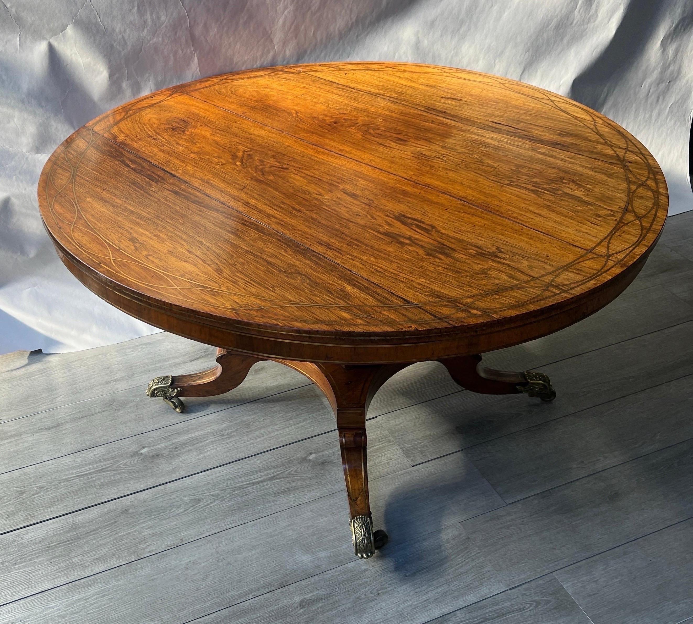 19th Century Fine 19th century brass inlaid rosewood English Regency period center table   For Sale