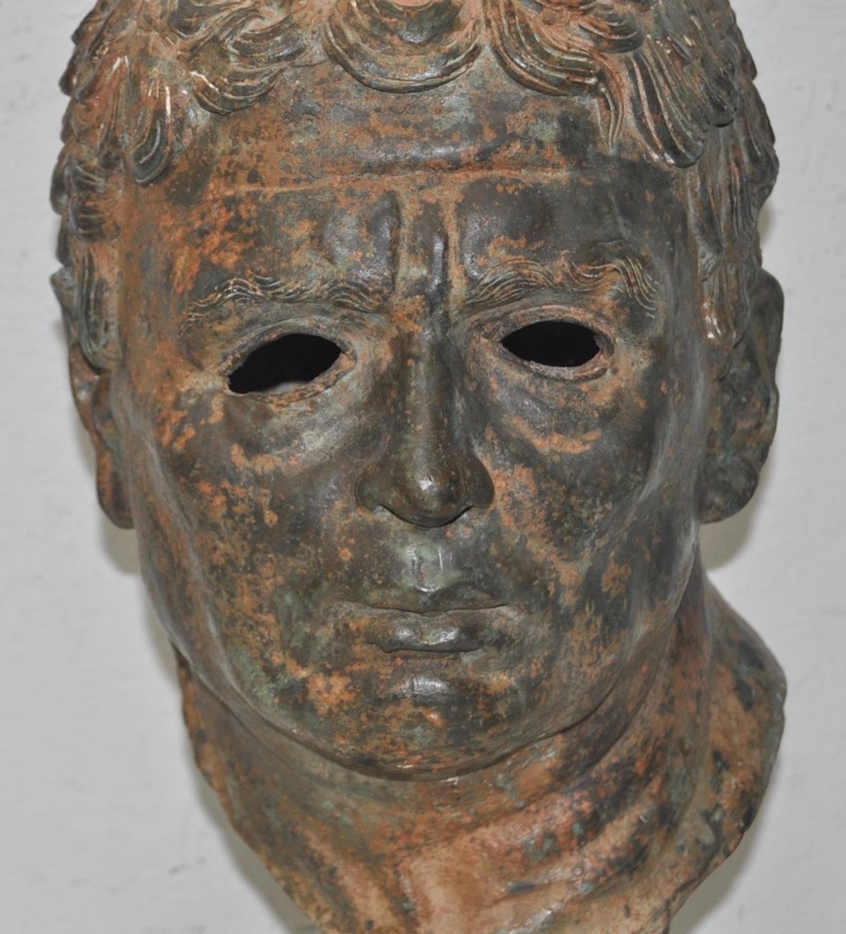 Fine 19th century bronze head after Greek antiquities

This is a remarkable bronze head in the style of Greek antiquities. 

A life-sized head of a young man with strong features and low cropped hair. The head sits on a stand and can be