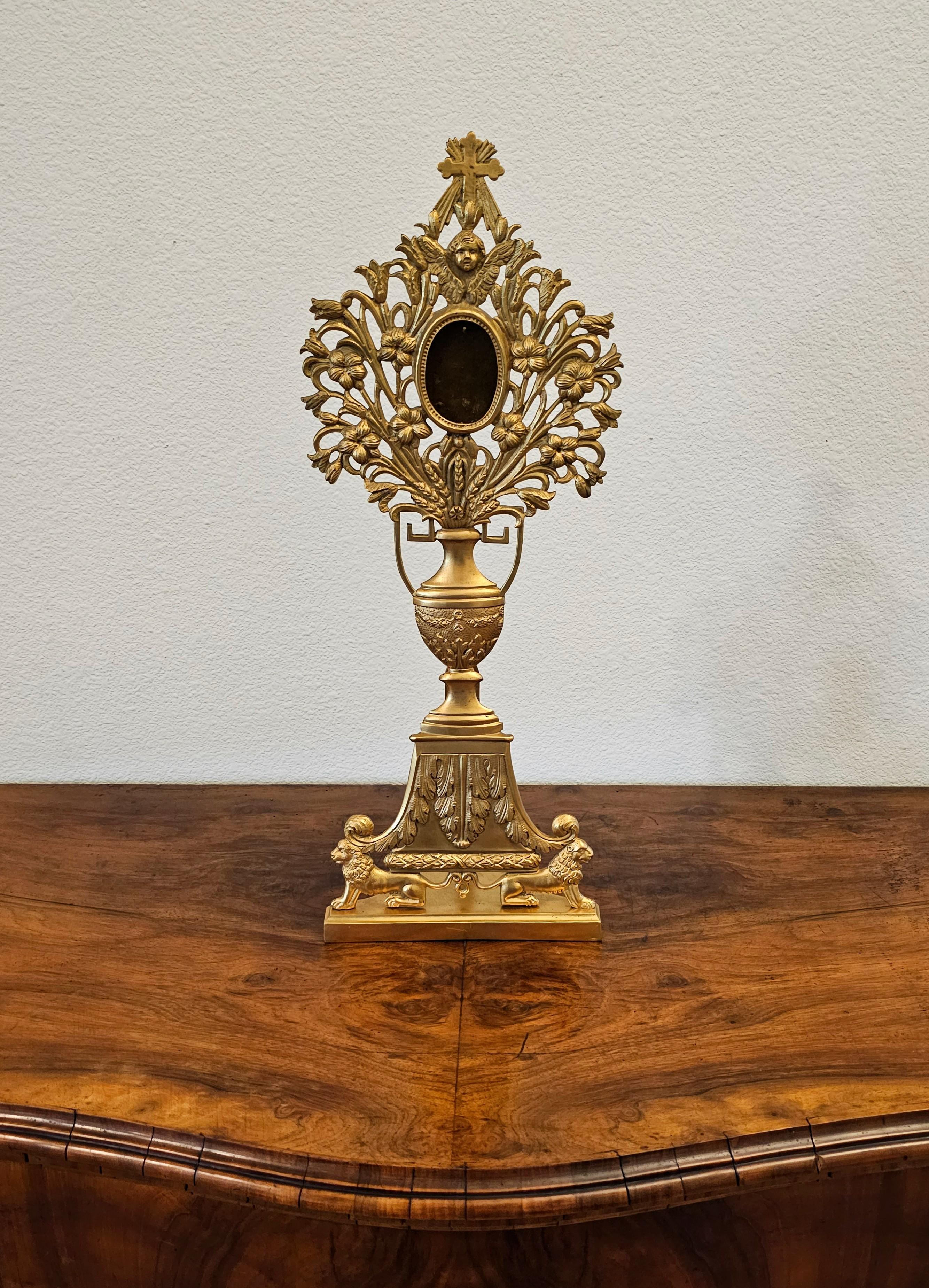 A scarce fine quality neoclassical Empire style vasiform gilt bronze ormolu church religious relic altar monstrance reliquary.

Exquisitely hand-crafted in Continental Europe in the second half of the 19th century, most likely French Napoleon III
