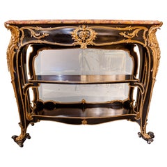 Raffinata console francese del XIX secolo in bronzo dorato ed ebanizzato firmata Zweiner