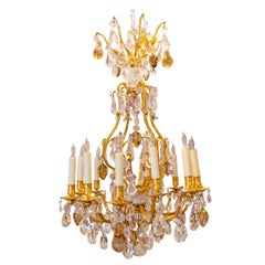 Lustre en cristal de roche et bronze doré Louis XV du XIXe siècle