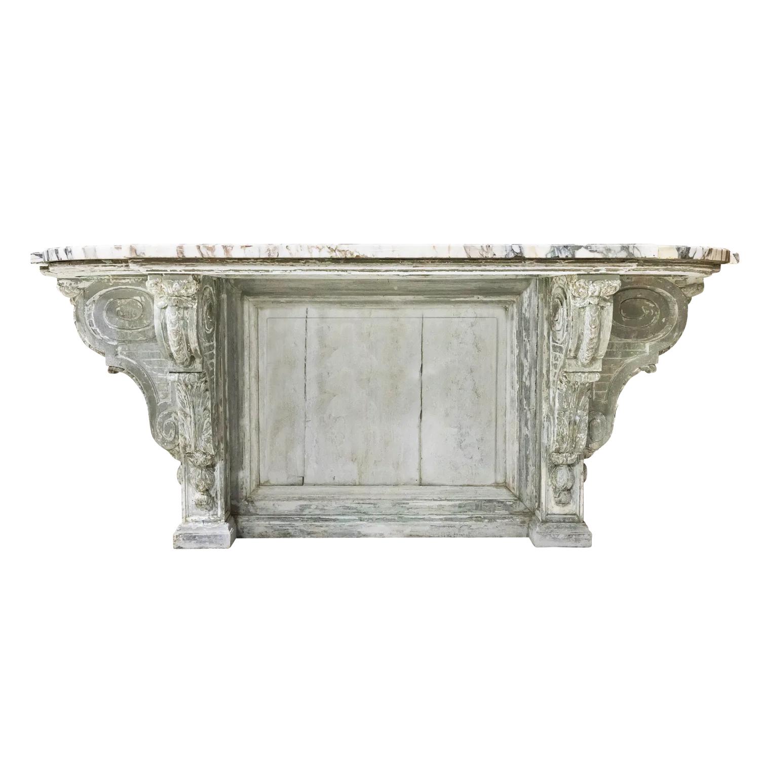 A very fine 19th century French Regence style painted console handcrafted in Provence near Arles, circa 1880s. Featuring the original beveled and shaped Calacatta marble top that is contoured to follow the intricacies of the base below, it provides