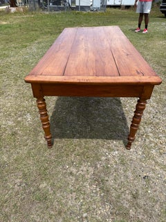 Fine 19th century French walnut and Elm dining table with turned legs and drawer