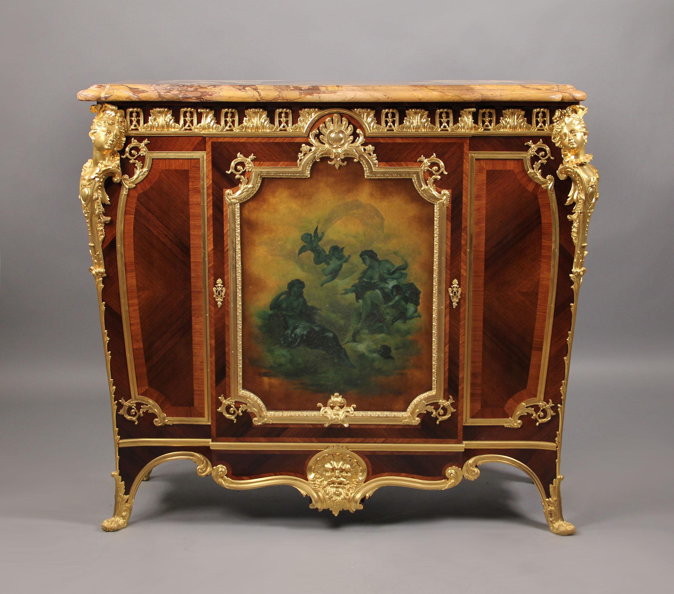 A very fine late 19th century gilt bronze-mounted Louis XV style Vernis Martin cabinet.

By Joseph Zwiener.

The central section finely decorated door panel displaying an allegorical 'Vernis Martin' scene, within a gilt bronze banded frame. With