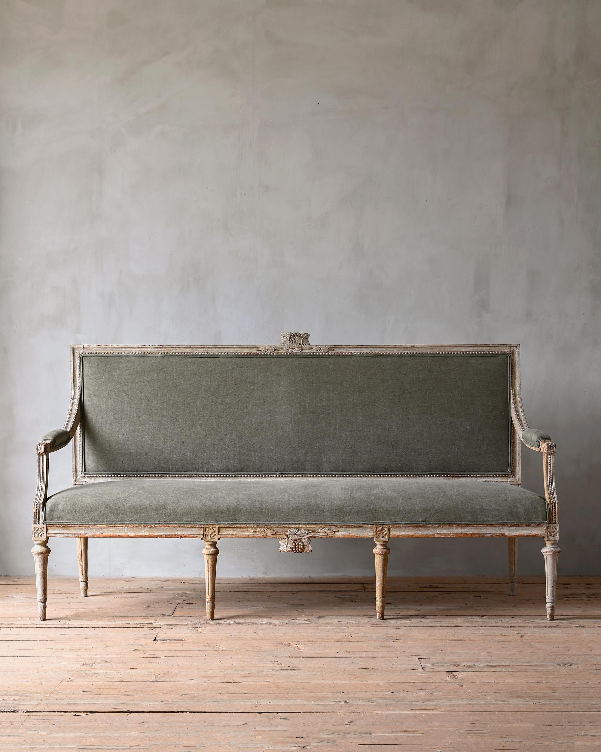 Fine 19th century Gustavian sofa in its original finish newly upholstered in an green linen. Ca 1800 Sweden. 