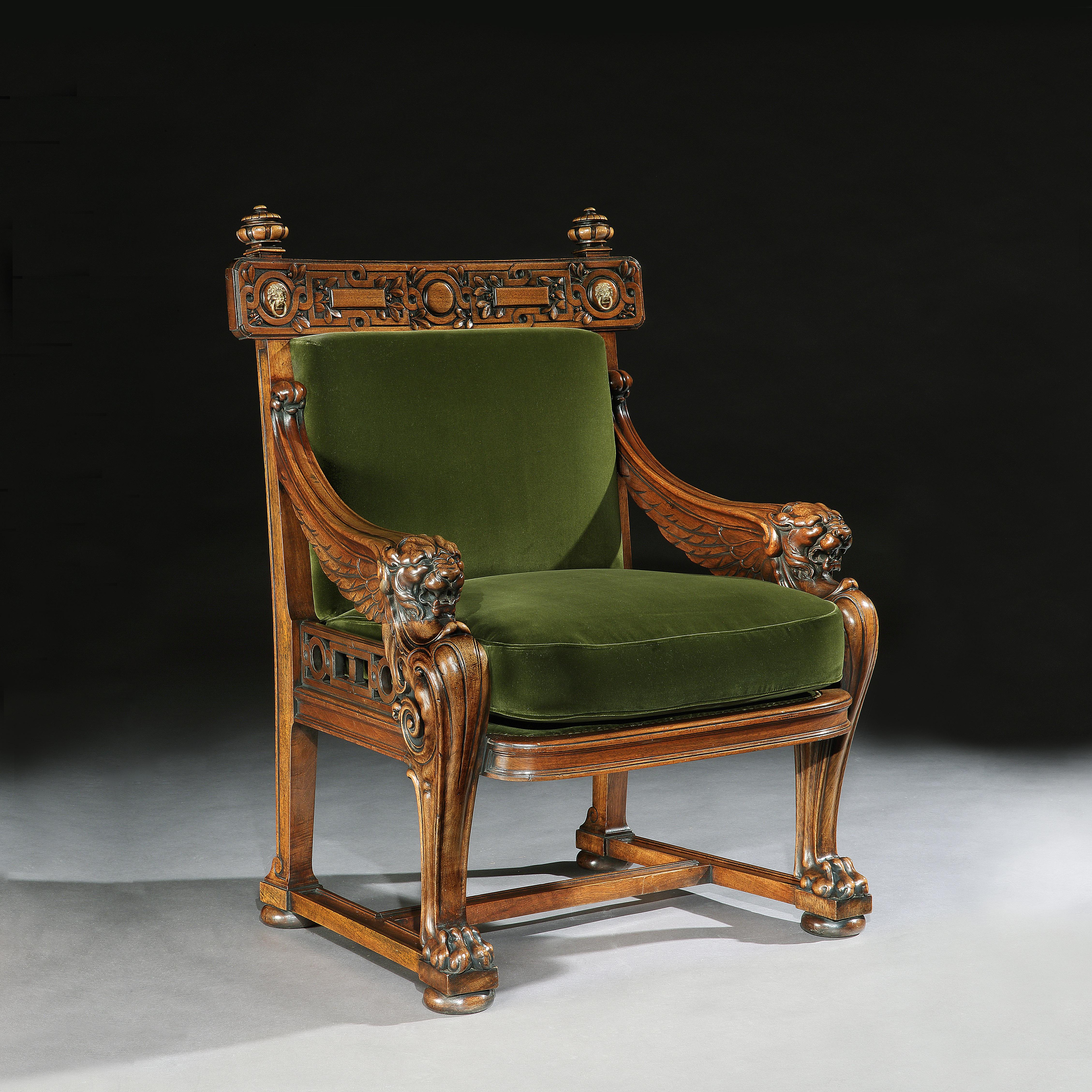 A very fine and impressive European walnut monopodia library armchair, upholstered in a Rosie Uniacke cotton velvet moss, an almost identical armchair having been published in ‘English Furniture 1500-1840 by Geoffrey Beard & Judith