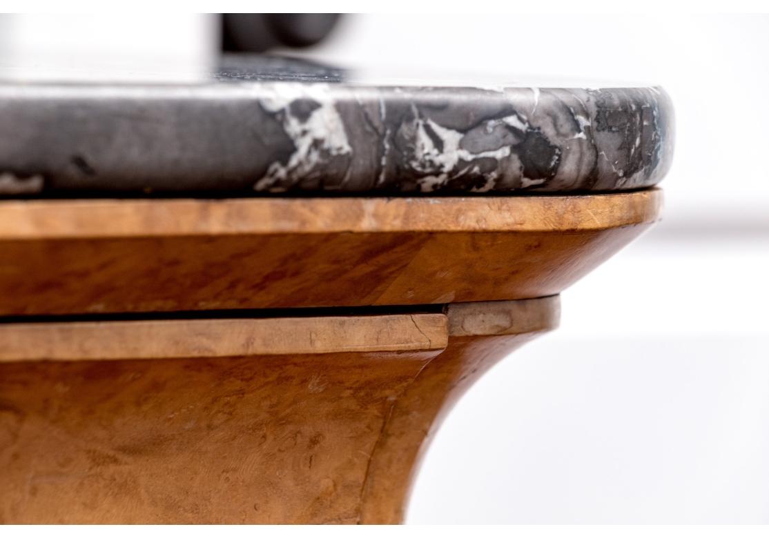 A exceptional Chest with fine traditional French form and Belgian Marble top with great patterning and color.  Standing on four feet, including front rounded feet and back squared feet. The Case with three long drawers below a top concealed drawer