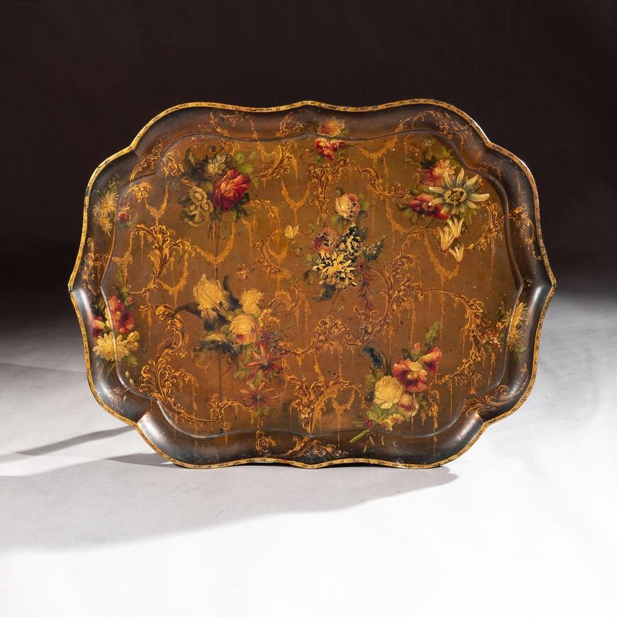 A superb large hand painted papier-mâché shaped tray impressed to verso by the Royal Makers Jennens & Bettridge, London.

English, circa 1830.

Beautifully hand painted and gilt shaped tray on a gold ground decorated with rose flowers and