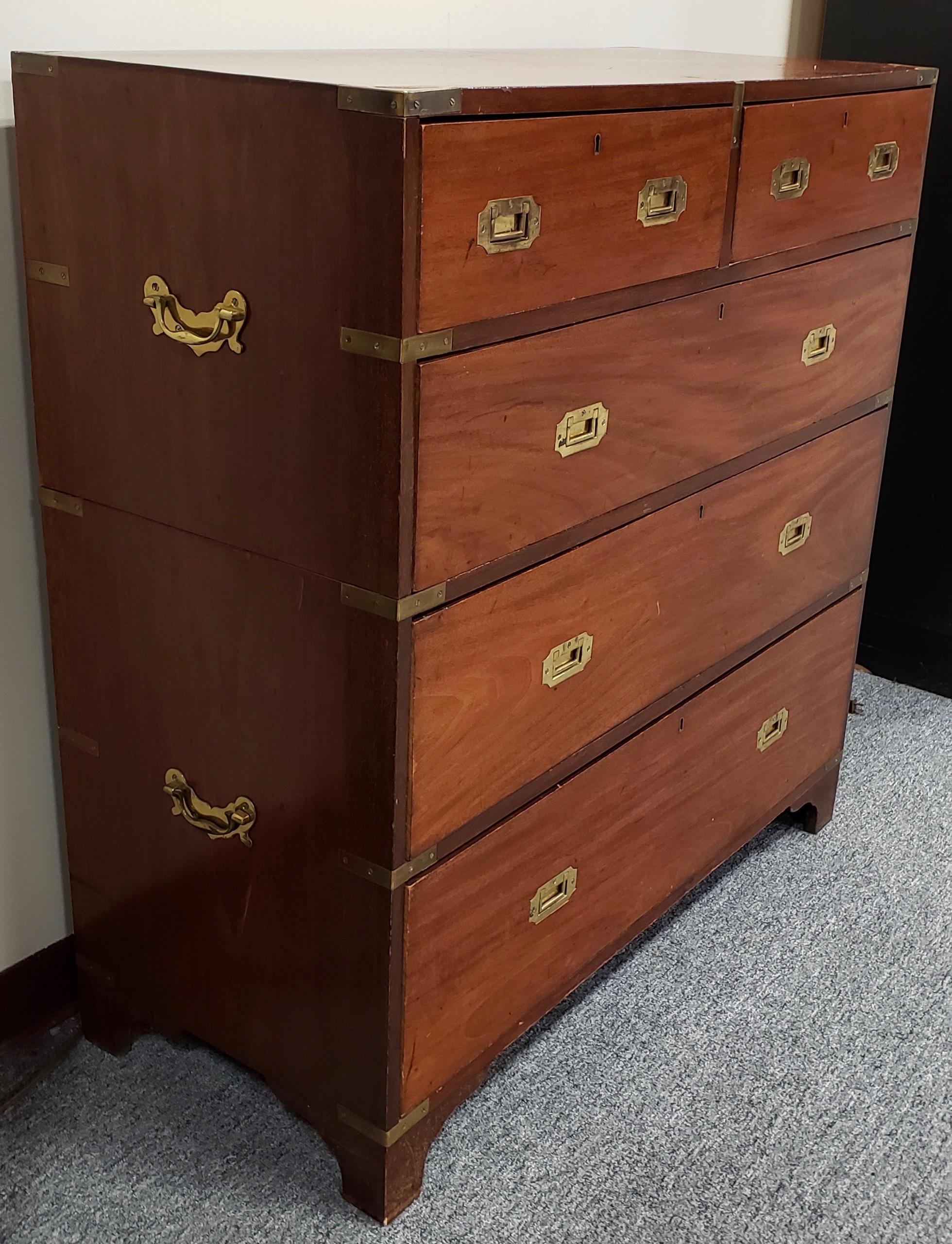 Fine 19th century solid mahogany campaign chest

The stacking two over three drawer chest is hand made in Ireland by P Beakey cabinetmaker. 

Quality built with dovetail construction and solid brass recessed hardware. Handles on the