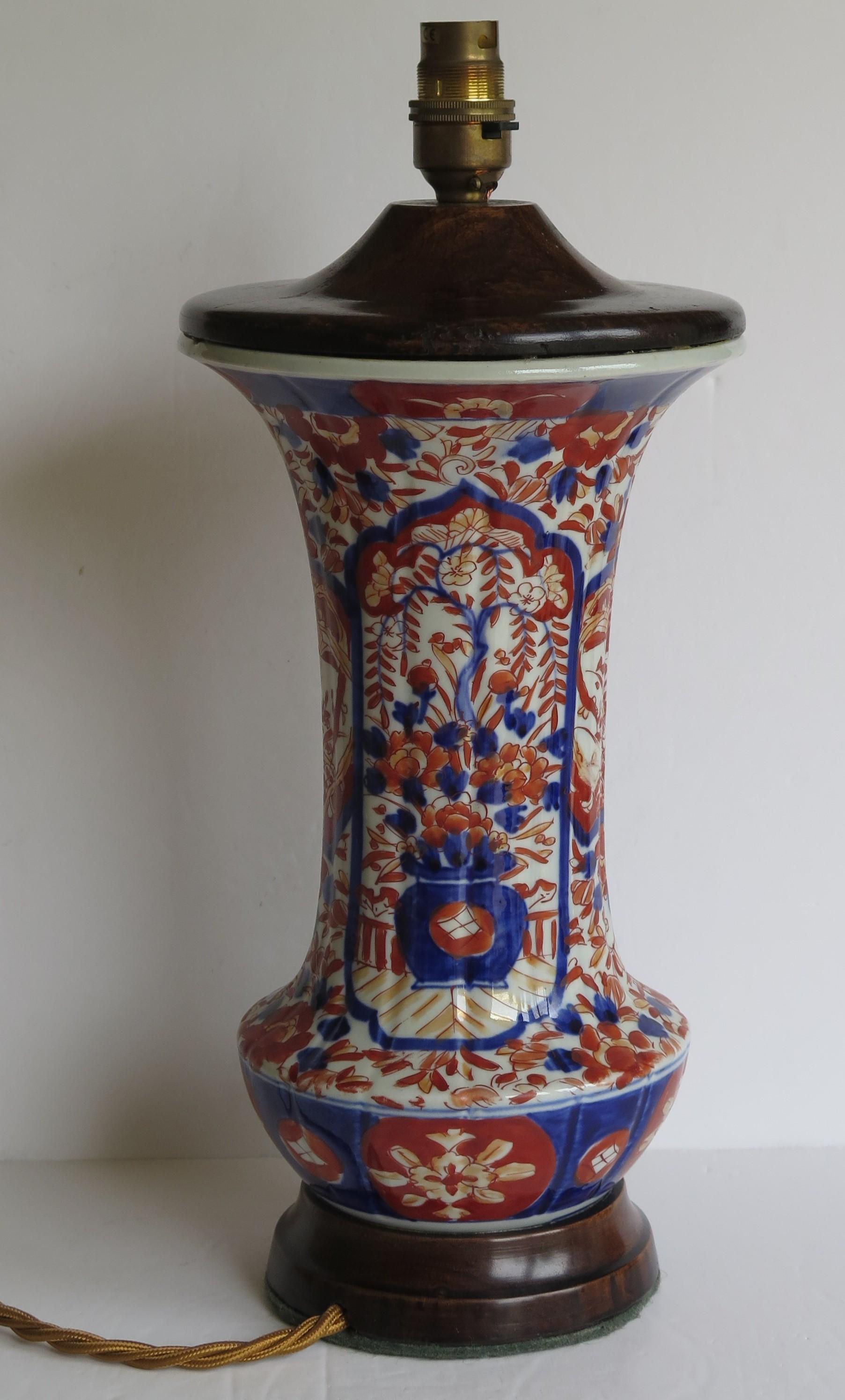 This is a good quality and very decorative, hand painted Imari Japanese Porcelain vase, converted to a table lamp which we date to the Meiji period of the 19th century, circa 1875.

This vase is tall and has been well hand-painted in varying